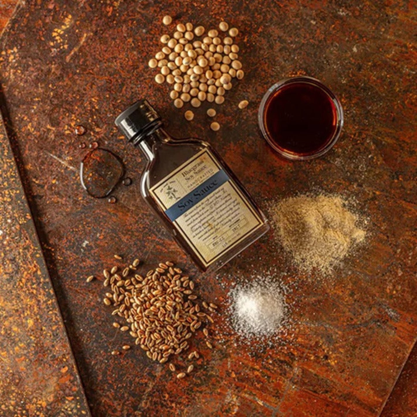 Bluegrass Soy Sauce is microbrewed in small batches using only whole Kentucky grown Non-GMO soybeans, soft red winter wheat, and the purest limestone filtered Kentucky spring water. We ferment and age the soybean mash in re-purposed bourbon barrels. It’s smoky and brothy with hints of oak and a mild sweetness reminiscent of fine Kentucky bourbon.