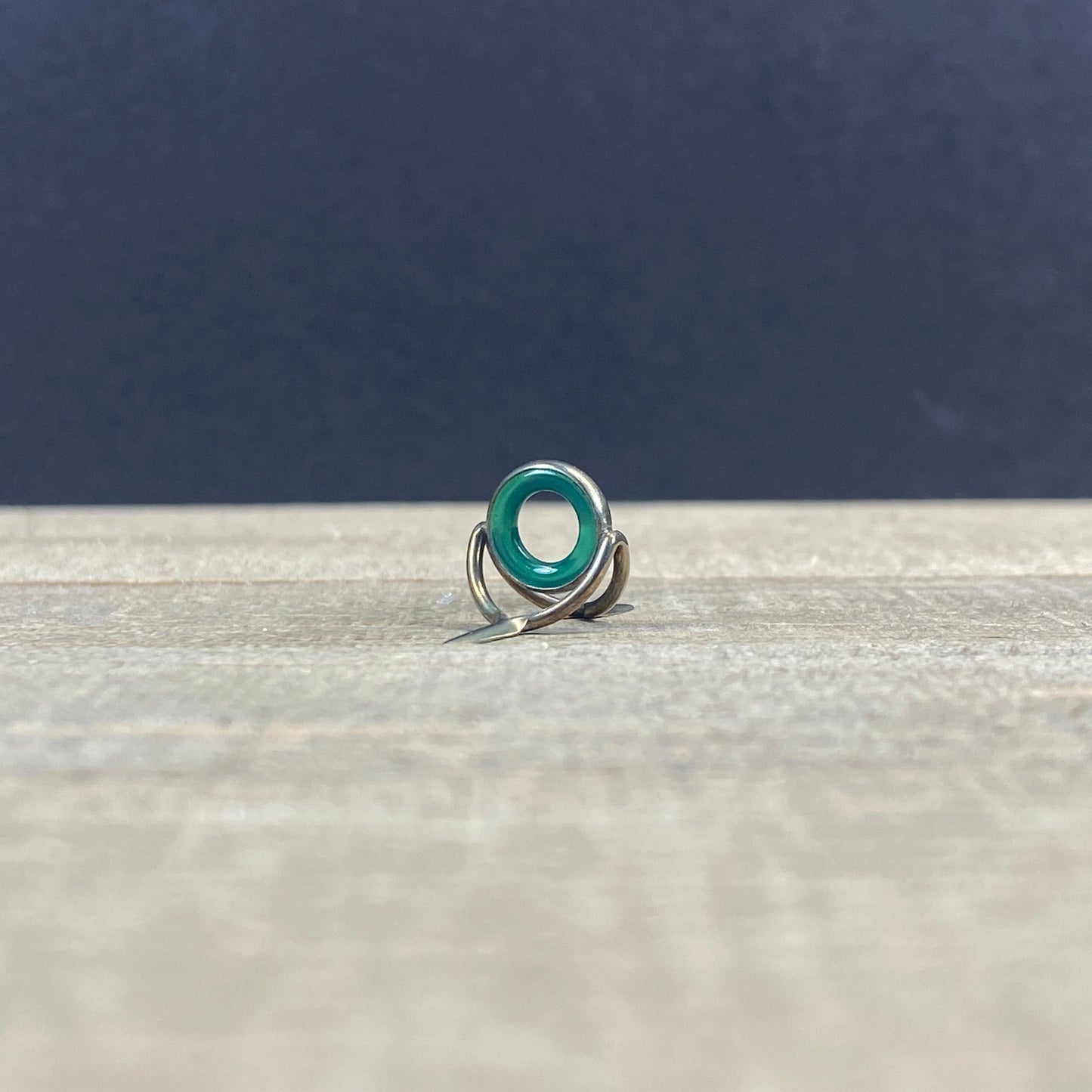 Perfect Agate Stripping Guides are handcrafted, demanding the highest quality workmanship and finish. Each Agate Stone is one of a kind, revealing its own vivid colors and character. 
This is the guide you will receive
Black Nickel is not recommended for saltwater