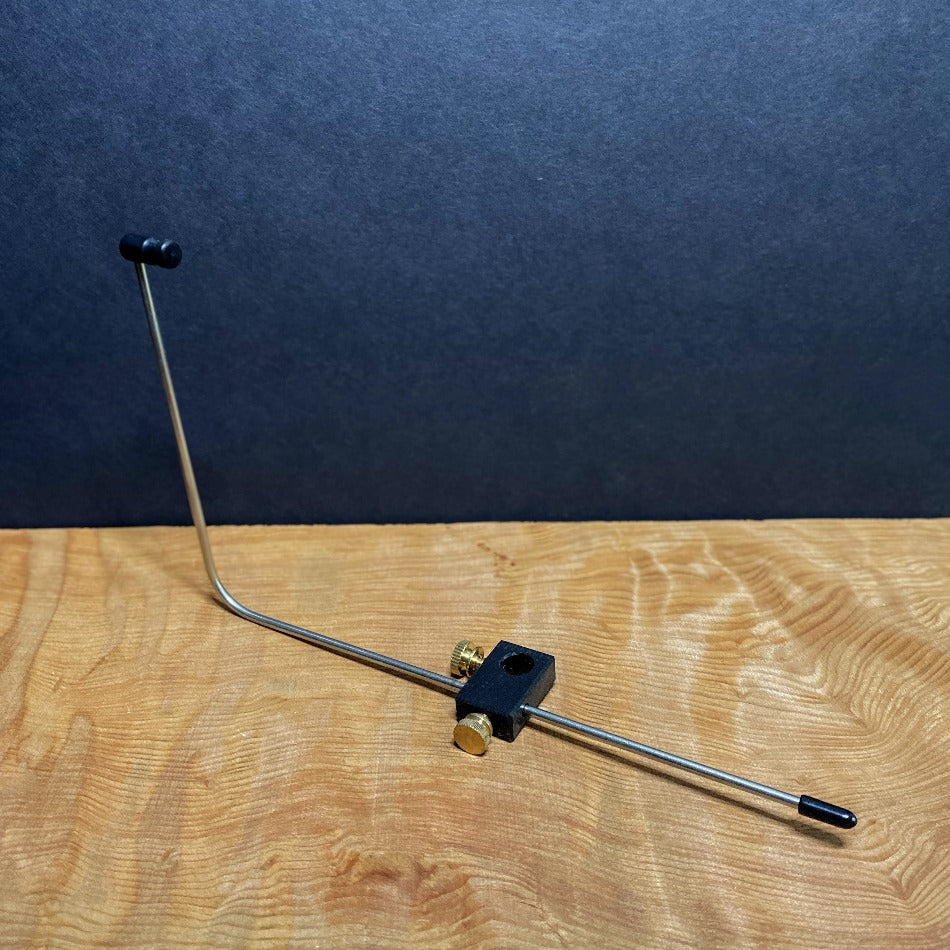 HMH Bobbin Rest  Machined delrin support body and thread support.  Machined brass fittings.  Stainless rod is 9″ long with 4″ upright. Adjustable in three directions.