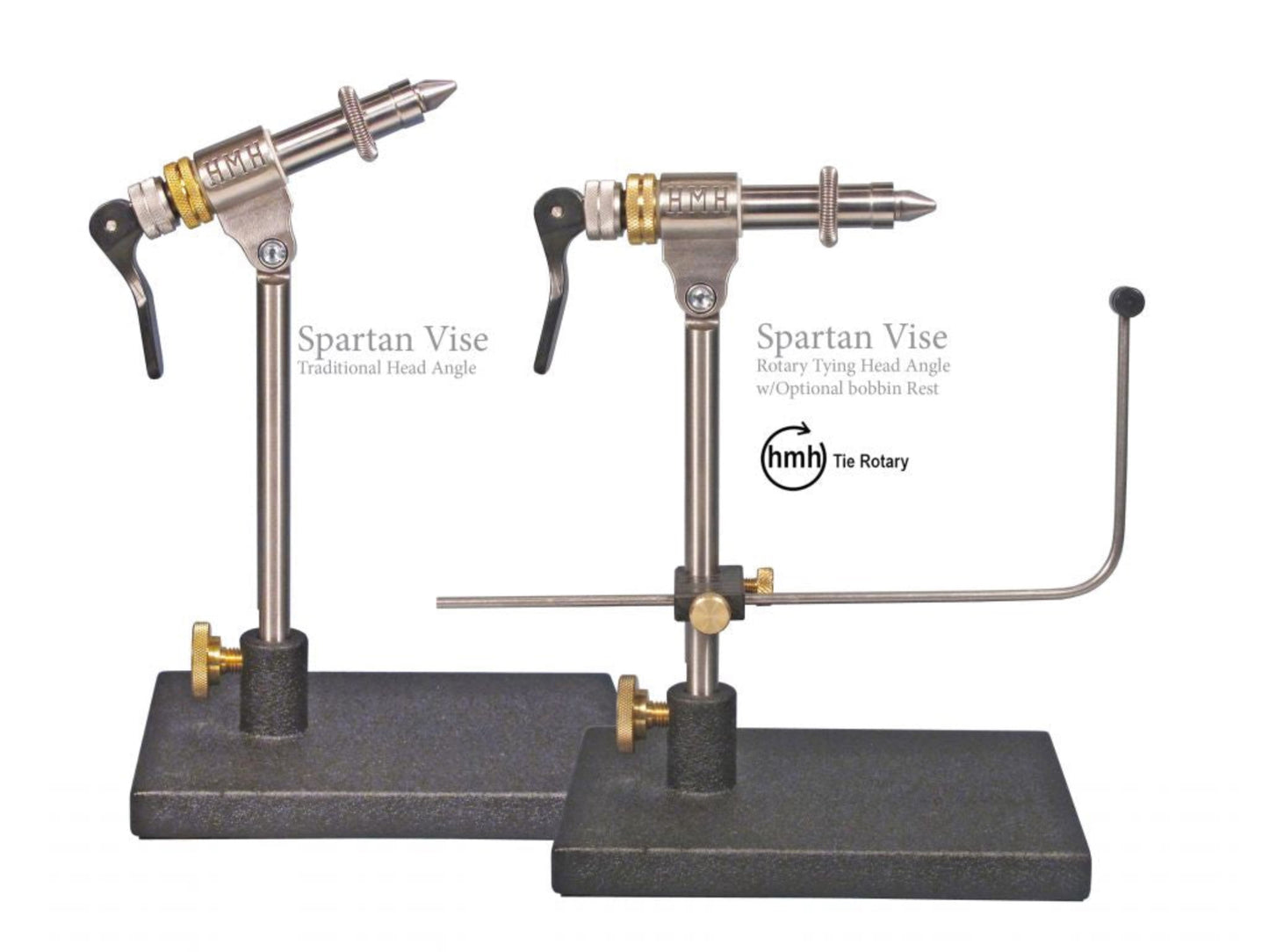 Two HMH Spartan Vises with brushed stainless steel chassis and gold-colored adjustment knobs, displayed on a black stand with the text 'SPARTAN VISE' and 'Infinite Head Angle Adjustment'.