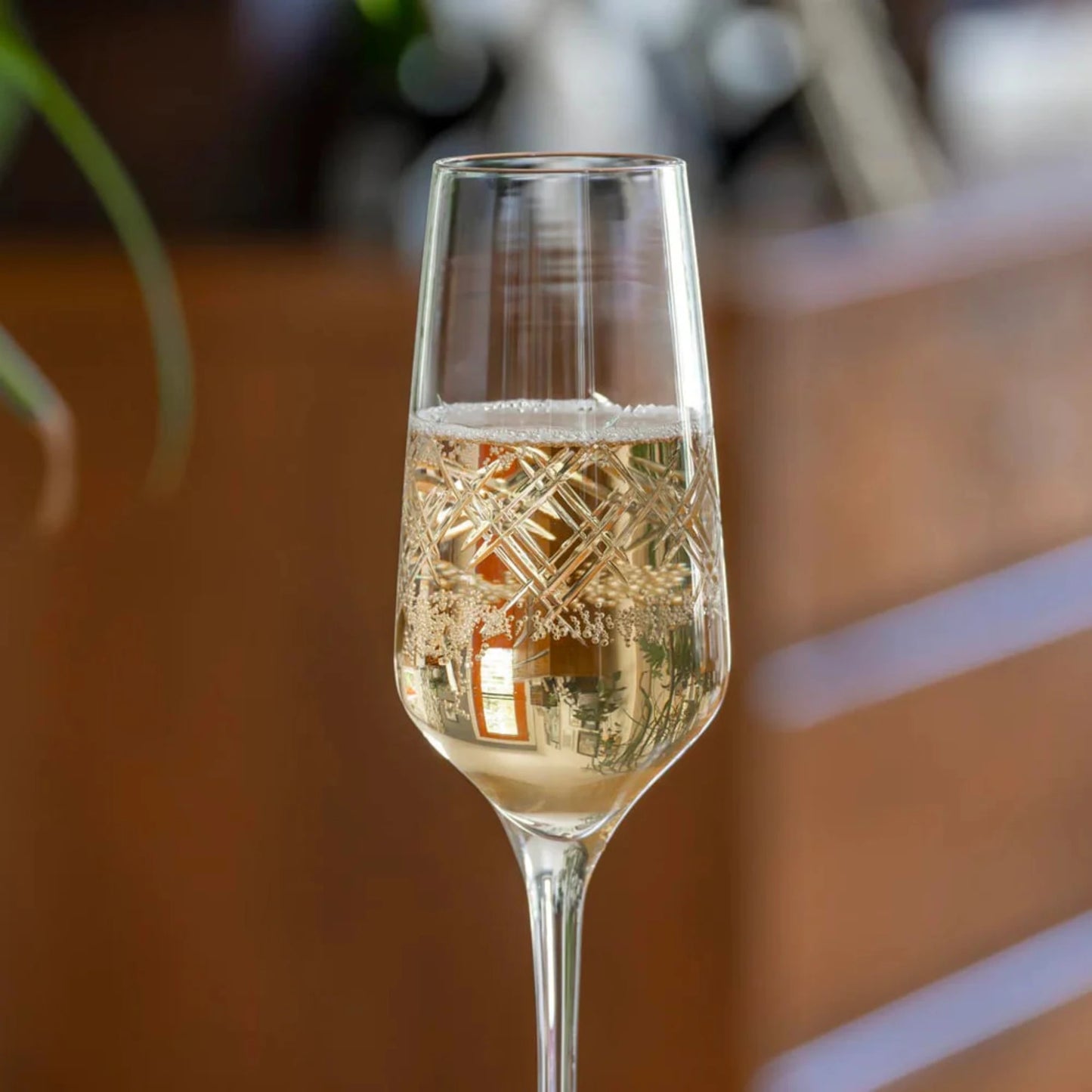 Experience the elegance of the Argyle 5.75oz Champagne Flute by Rolf Glass. Adorn by the classic diamond pattern, this flute is perfect for celebrating special occasions in style. Its timeless design and high-quality craftsmanship make it a must-have for any wine enthusiast. Whether you're toasting to a milestone or enjoying a quiet evening at home, this flute will elevate your drinking experience.