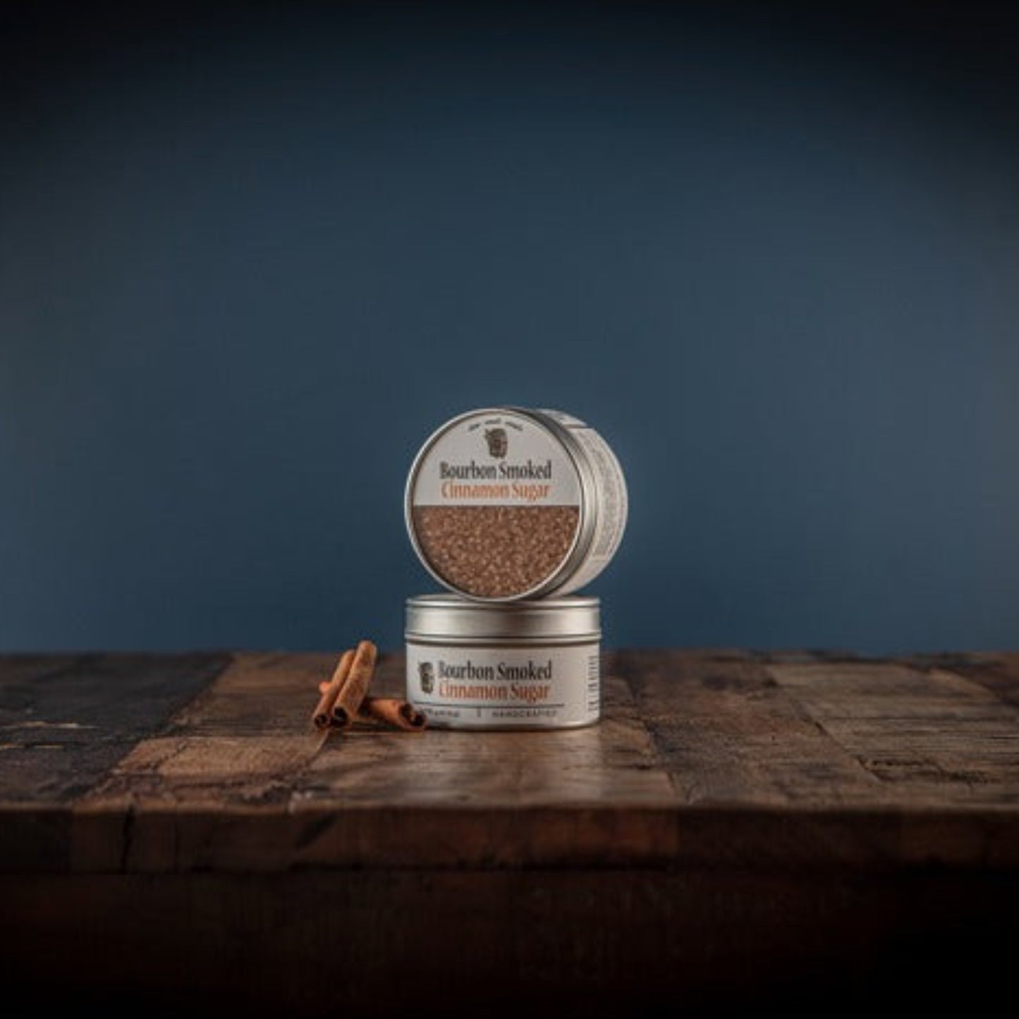 Bourbon Smoked Cinnamon Sugar is a raw sugar smoked with repurposed bourbon barrel staves blended with aromatic cinnamon spices. It offers a combination of sweet caramel, rich smoky oak, and comforting cinnamon flavors, making it a perfect complement for fruits, pies, coffee, tea, and cocktails.