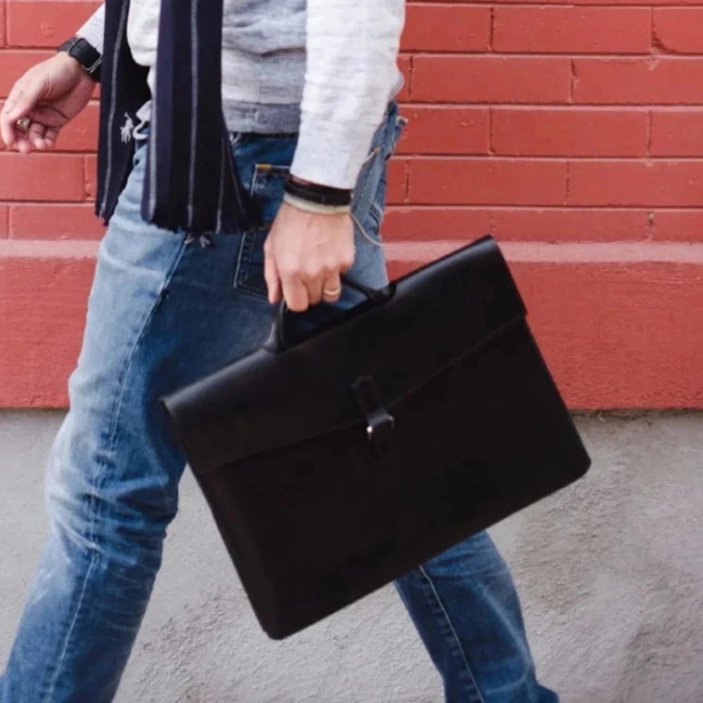 The Diplomat Attaché functions as a carry tool for a laptop, wallet, cell phone, and all your other accessories. It can be carried at your side by its reinforced leather handle or cross-body with the included shoulder strap for a sleek appearance. The top grain leather will keep your gear well protected while looking better over time.