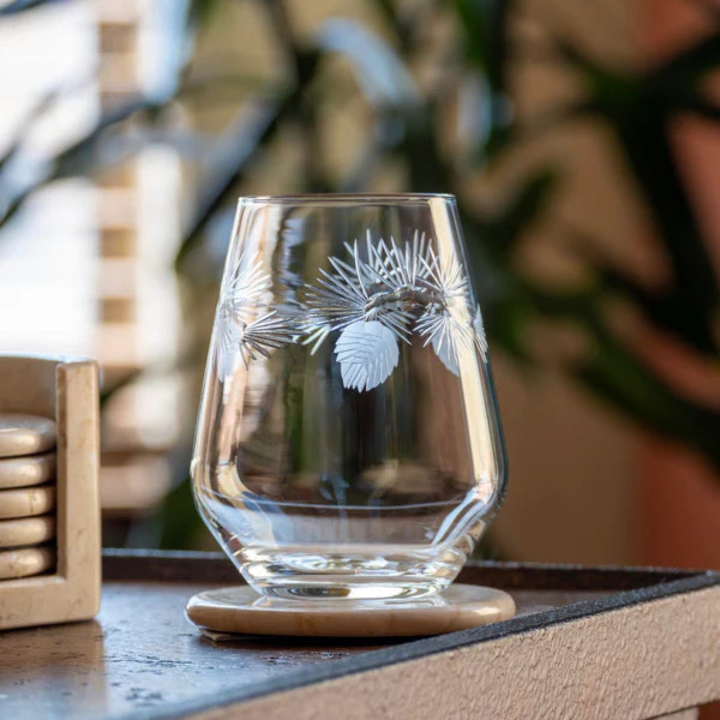 Nothing represents the great outdoors like an evergreen tree. This delightful, multi-facetted Icy Pine glassware collection by Rolf Glass brings the outdoors to your table. Contrasting pine needles are diamond-wheel engraved and brilliantly polished to add dimension and sparkle. American made, these decorated glasses are ideal for any occasion from your holiday table to your picnic table.