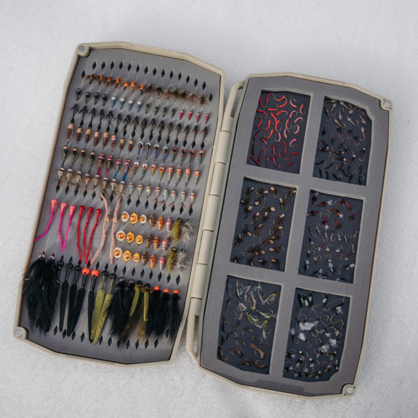 Tailwaters are challenging fisheries that demand versatility, requiring everything from size 24 dries to size 10 leeches and all the right shades of sow bugs.
The new Tailwater UPG box perfectly balances fast, small-fly access with the capacity to hold and organize larger patterns.
 When the fishing gets complex Umpqua’s new UPG Tailwater Box makes it easy to stay organized.
- Holds 501 flies or more
MICRO SLIT INSERT:
 
- Small Fly Storage
- Flat Foam means that hook eyes don’t fall