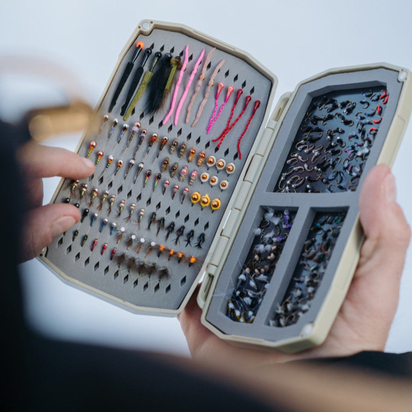 Tailwaters are challenging fisheries that demand versatility, requiring everything from size 24 dries to size 10 leeches and all the right shades of sow bugs. The new Tailwater UPG box perfectly balances fast, small-fly access with the capacity to hold and organize larger patterns. When the fishing gets complex Umpqua's new UPG Tailwater Box makes it easy to stay organized.
- Holds 275 flies or more