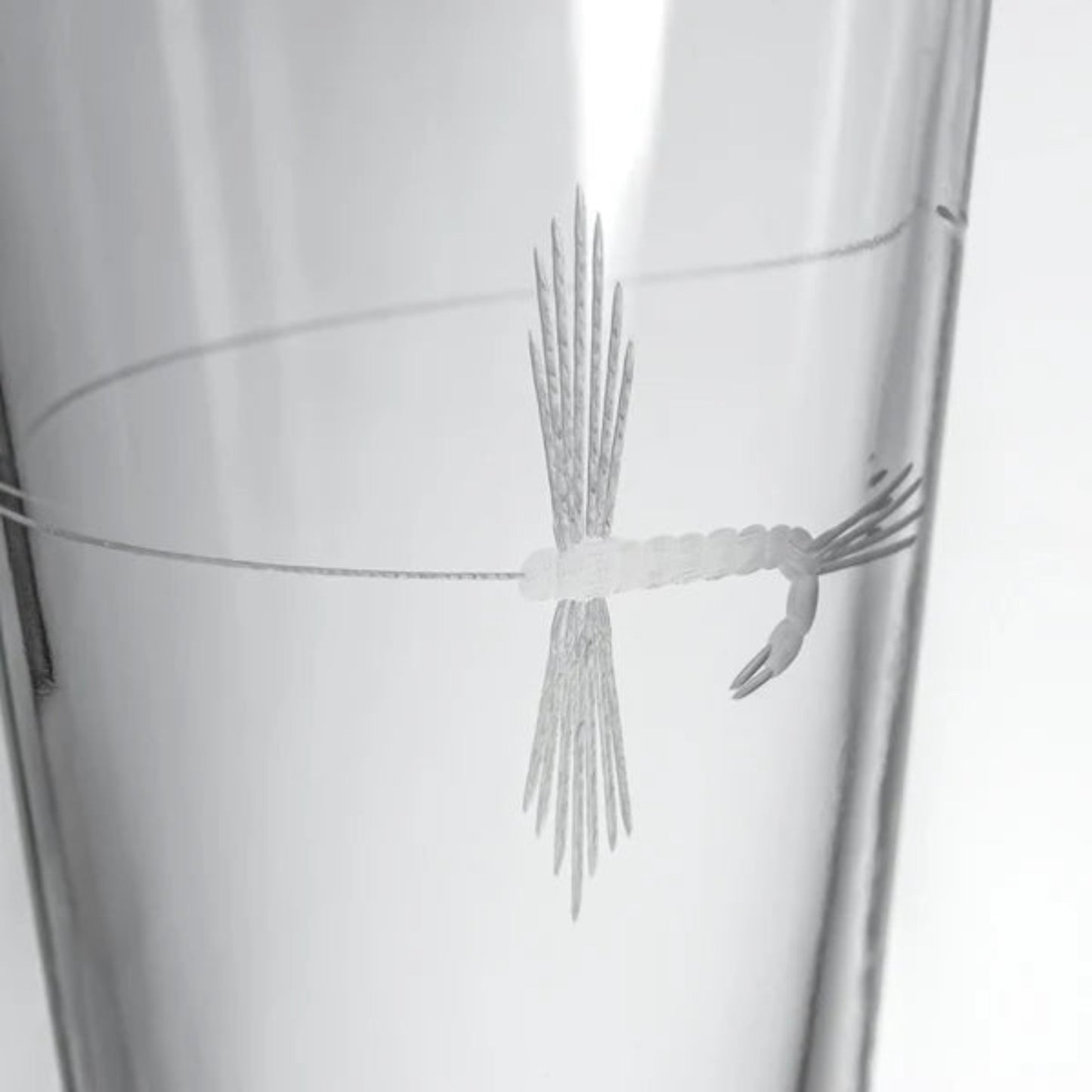 Experience the thrill of fly-fishing with our Rolf Glass Fly Fishing 16oz Beer Pint Glass. Perfect for outdoorsmen and nature enthusiasts. Shop now!