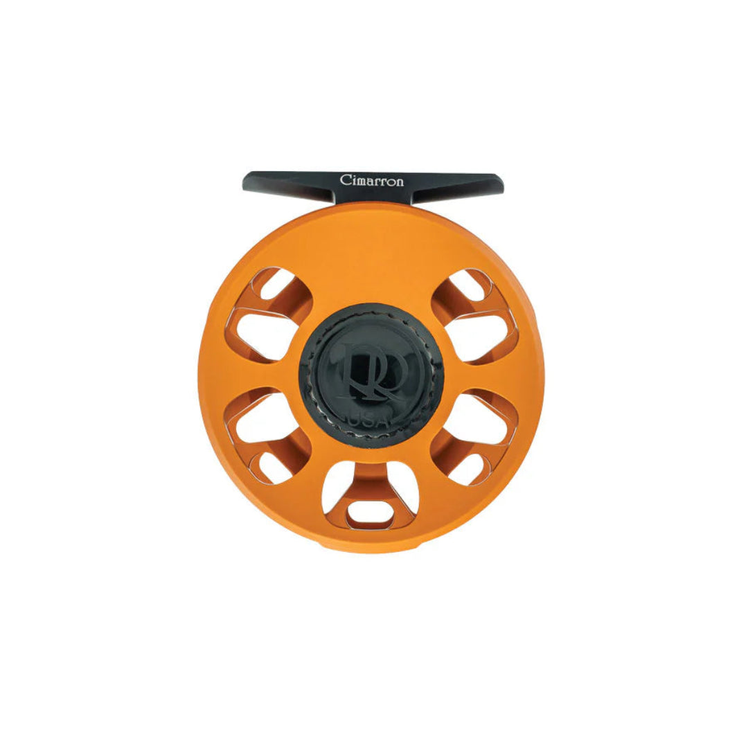 Orange fishing reel with black center on a white background
