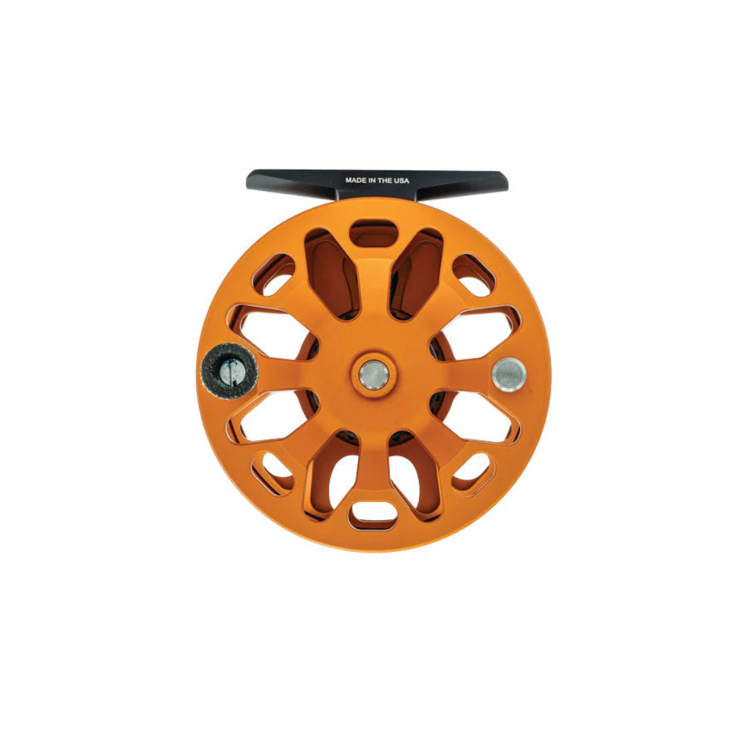 Orange fishing reel on a white background