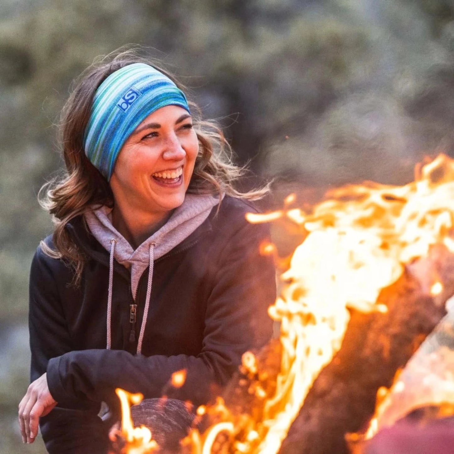 Person wearing BlackStrap Multifunctional Headband outdoors, demonstrating UV protection and breathable fabric for fishing and outdoor adventures