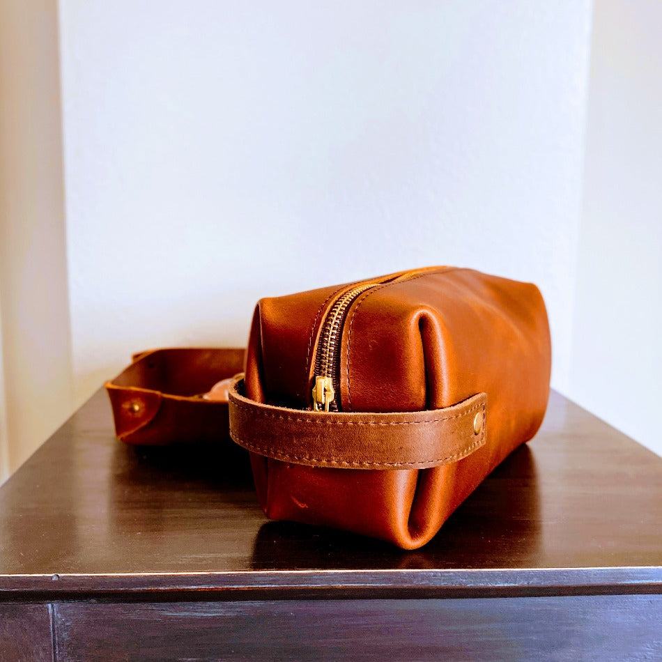 Experience luxury and reliability with High Line Leather Pouch. Crafted with premium-grade leather and robust brass zippers, this pouch comes in three sizes to suit your lifestyle. Whether for the office, an outdoor adventure, or traveling the globe, this pouch will keep your things protected and stylishly stored.