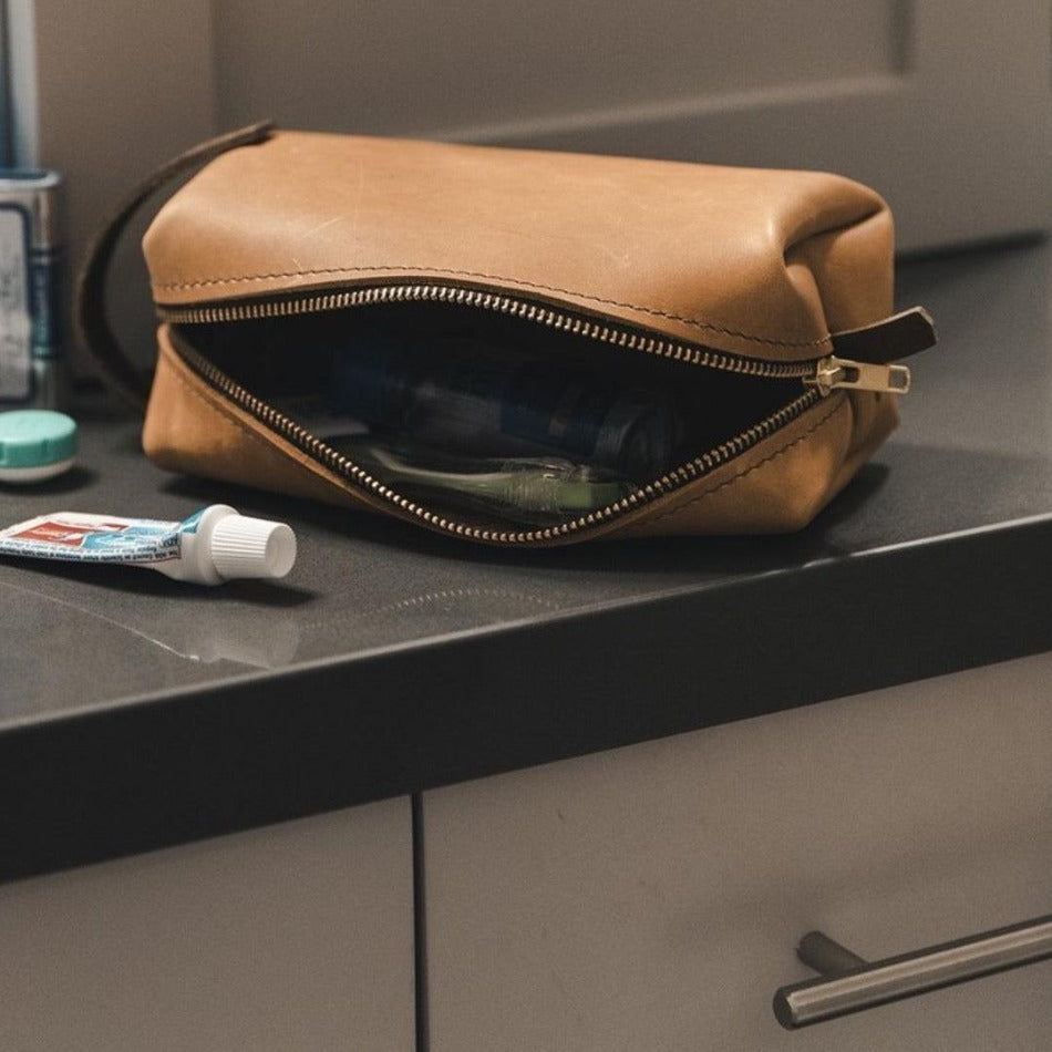 Experience luxury and reliability with High Line Leather Pouch. Crafted with premium-grade leather and robust brass zippers, this pouch comes in three sizes to suit your lifestyle. Whether for the office, an outdoor adventure, or traveling the globe, this pouch will keep your things protected and stylishly stored.