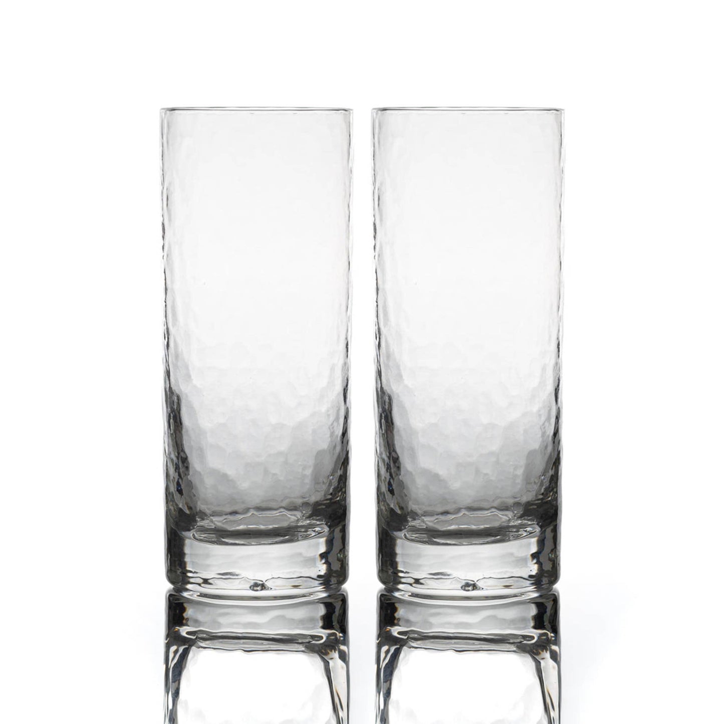 Two clear glass tumblers on a white background
