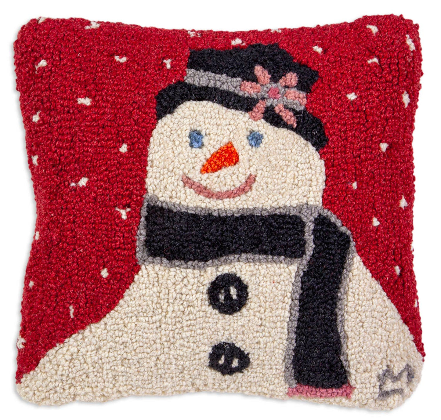 Decorative pillow with a snowman design on a red background