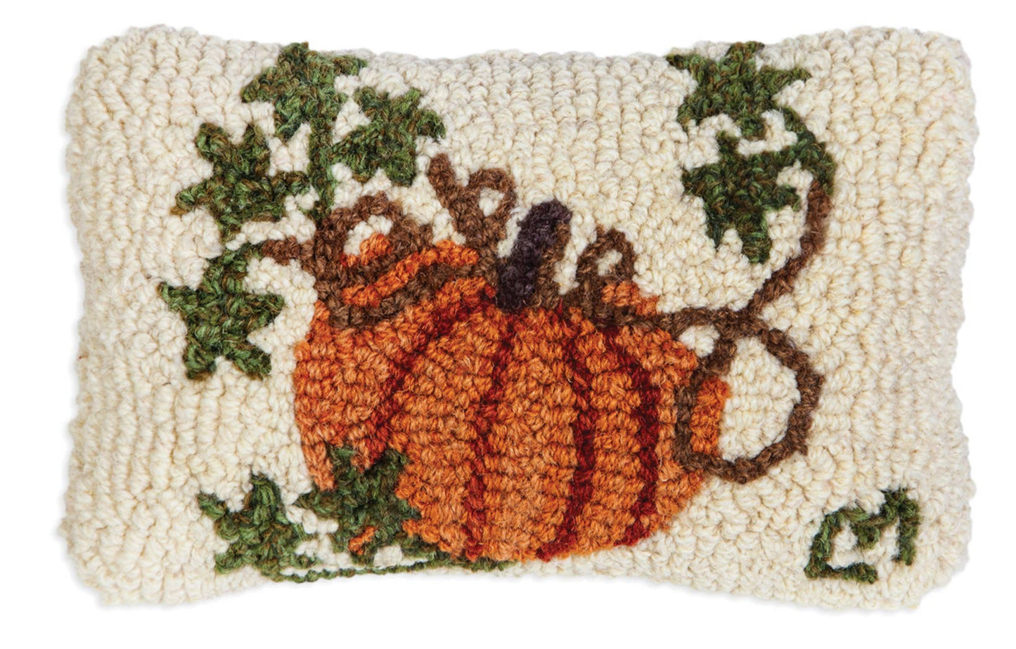 Decorative pillow with pumpkins and leaves on a beige background