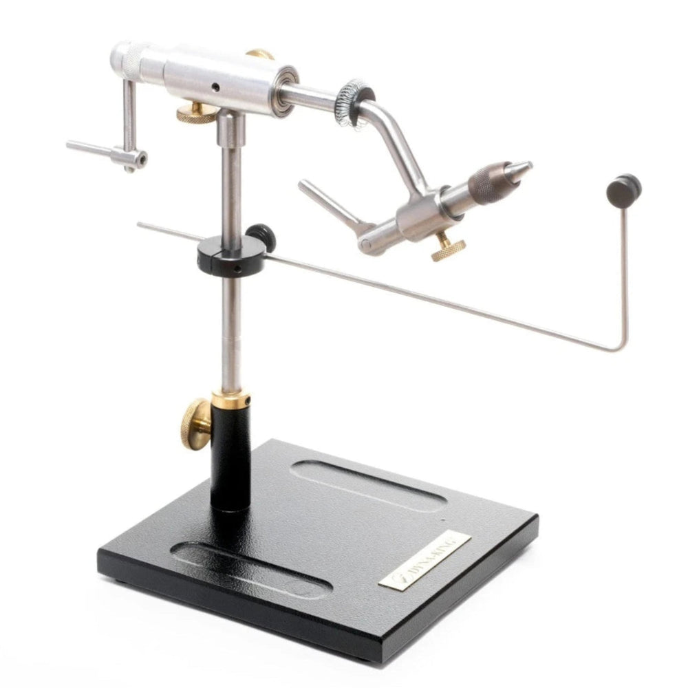This finely crafted vise offers all of the great features preferred by professional tyers everywhere. With high grade brass knobs, all stainless-steel construction except the jaws made out of hardened tool steel, smooth rotation with precision ball bearings, easy height adjustment, 90° handle for speed crank, convenient material clip, notch lock cam, excellent hook holding capability 32 to 8/0, and bobbin hanger included.