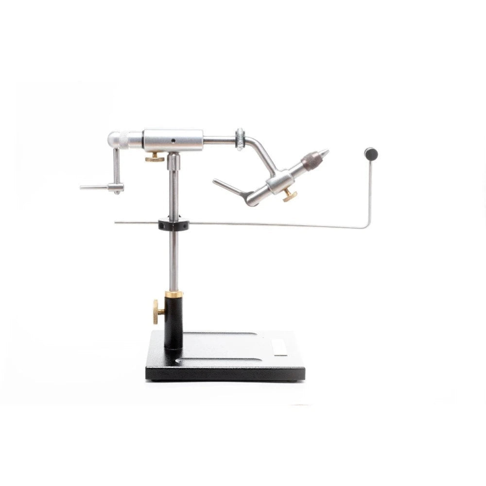 This finely crafted vise offers all of the great features preferred by professional tyers everywhere. With high grade brass knobs, all stainless-steel construction except the jaws made out of hardened tool steel, smooth rotation with precision ball bearings, easy height adjustment, 90° handle for speed crank, convenient material clip, notch lock cam, excellent hook holding capability 32 to 8/0, and bobbin hanger included.