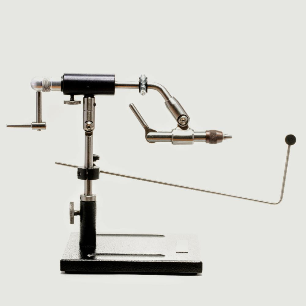 
                  
                    This finely crafted vise offers all of the great features preferred by professional tyers everywhere. With high grade brass knobs, all stainless-steel construction except the jaws made out of hardened tool steel, smooth rotation with precision ball bearings, easy height adjustment, 90° handle for speed crank, convenient material clip, notch lock cam, excellent hook holding capability 32 to 8/0, and bobbin hanger included.
                  
                
