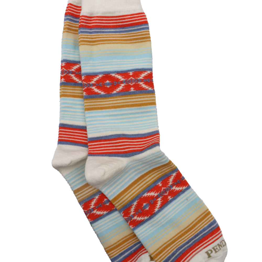 Experience the comfort and durability of our Beacon Serape Crew Socks by Pendleton Hosiery. These socks are crafted with smooth, lightweight merino wool, making them perfect for year-round wear. The ultra-durable design features reinforced heel and toe for extended wear. Made in the USA with imported yarns, these socks are a testament to our commitment to quality and comfort.