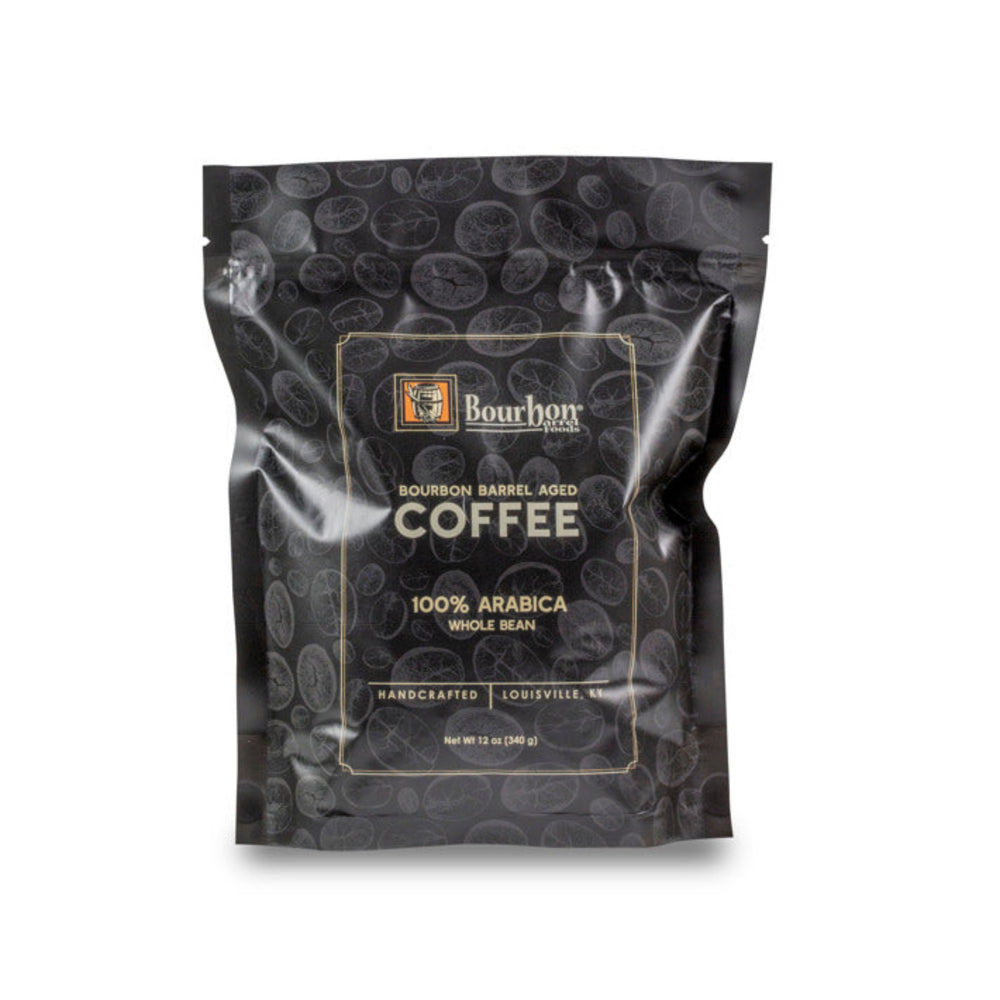 Experience the rich, velvety flavors of our Bourbon Barrel Aged Coffee. Our 100% Arabica beans are meticulously flame-roasted and then aged in bourbon barrels that once held fine Kentucky Bourbon. Each batch is carefully tested to ensure the perfect roast and aging time, resulting in a whole bean coffee with deep notes of chocolate, caramel, and a hint of bourbon. Despite having no alcohol content, the coffee inherits the robust, charred oak flavors from the bourbon barrels, offering a unique taste of the S