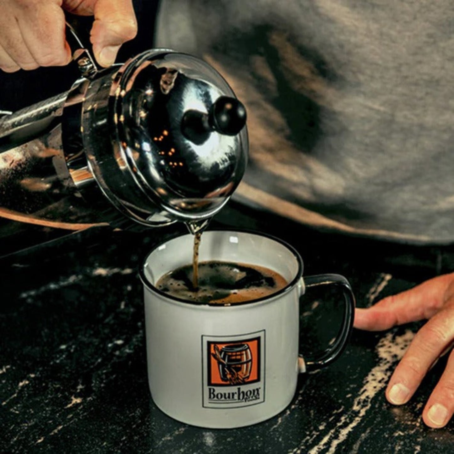 Experience the rich, velvety flavors of our Bourbon Barrel Aged Coffee. Our 100% Arabica beans are meticulously flame-roasted and then aged in bourbon barrels that once held fine Kentucky Bourbon. Each batch is carefully tested to ensure the perfect roast and aging time, resulting in a whole bean coffee with deep notes of chocolate, caramel, and a hint of bourbon. Despite having no alcohol content, the coffee inherits the robust, charred oak flavors from the bourbon barrels, offering a unique taste of the S