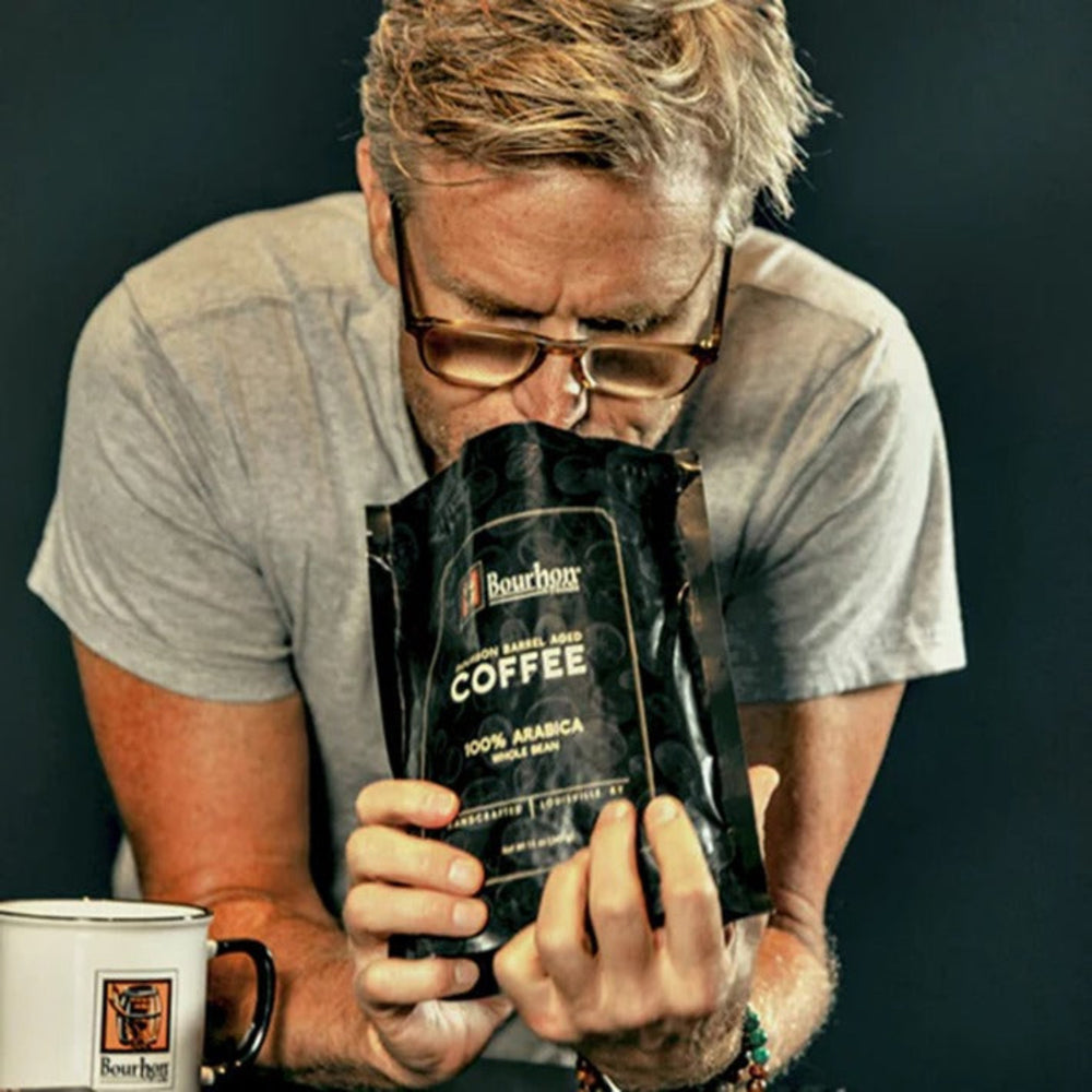 
                  
                    Experience the rich, velvety flavors of our Bourbon Barrel Aged Coffee. Our 100% Arabica beans are meticulously flame-roasted and then aged in bourbon barrels that once held fine Kentucky Bourbon. Each batch is carefully tested to ensure the perfect roast and aging time, resulting in a whole bean coffee with deep notes of chocolate, caramel, and a hint of bourbon. Despite having no alcohol content, the coffee inherits the robust, charred oak flavors from the bourbon barrels, offering a unique taste of the S
                  
                