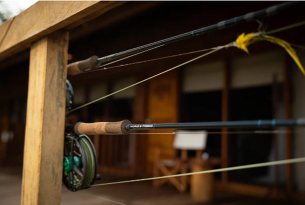 Exocett 88 fly rod by Thomas & Thomas - full length view showing premium blue finish and cork handle