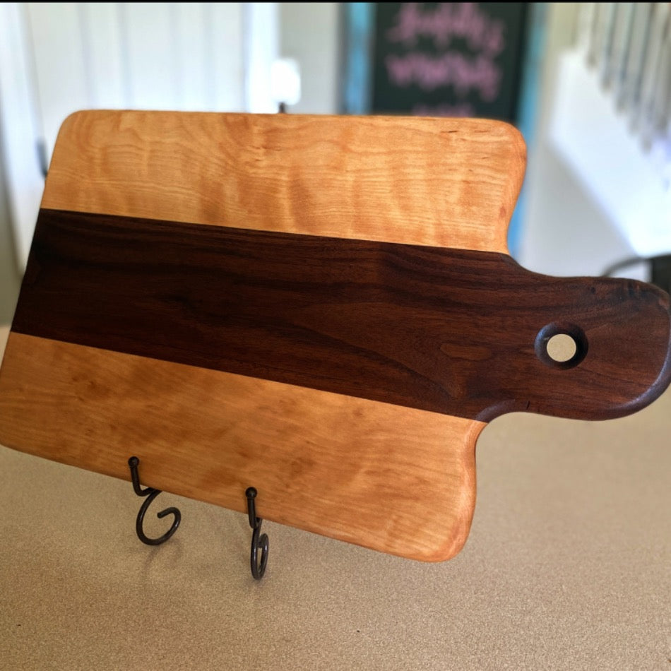 
                  
                    Handcrafted Charcuterie Board - Good Ole Beautiful Walnut and Hard Maple is sure to astound on any occasion It's the perfect blend of rustic charm and modern elegance - perfect for elevating meals and turning them into an unforgettable experience!
                  
                