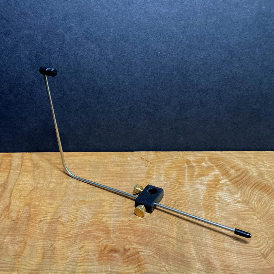 HMH Bobbin Rest  Machined delrin support body and thread support.  Machined brass fittings.  Stainless rod is 9″ long with 4″ upright. Adjustable in three directions.