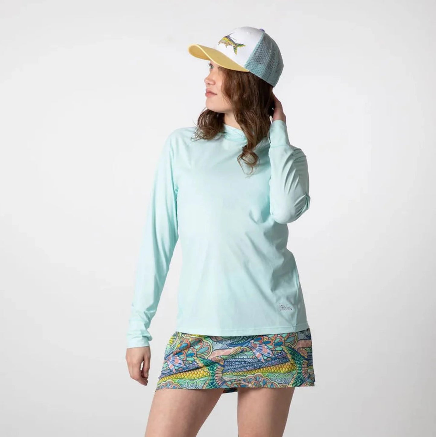 Close-up detail of Tropical Tarpon Ravine Skort showing the tropical tarpon fish print pattern and fabric texture