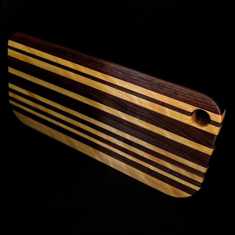 
                  
                    This awesome serving board or bread board is Handcrafted with Walnut & Curley Cherry. 
                  
                