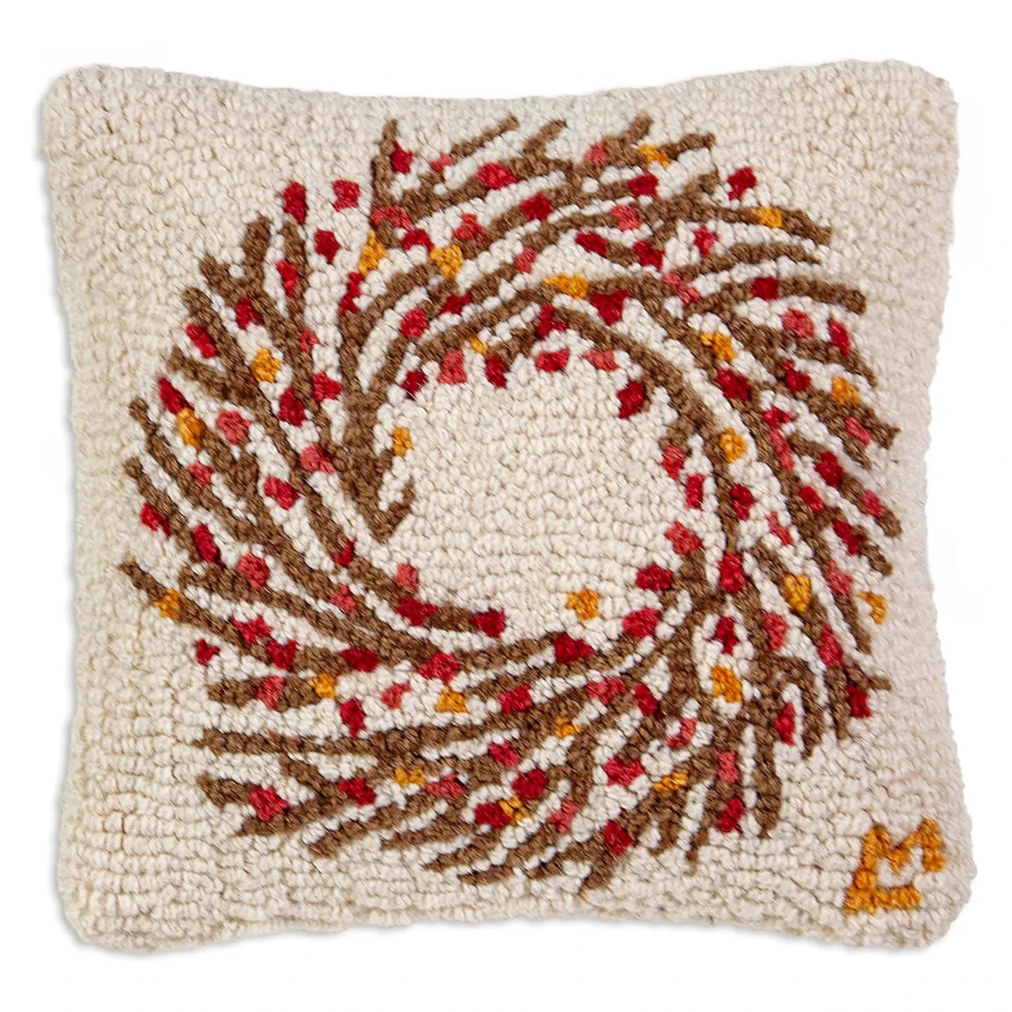 Decorative pillow with autumn leaf pattern on a beige background