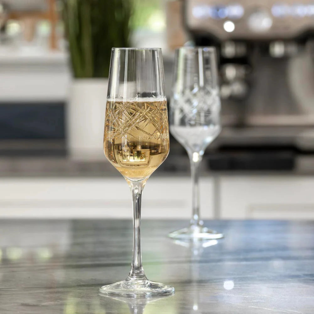 
                  
                    Experience the elegance of the Argyle 5.75oz Champagne Flute by Rolf Glass. Adorn by the classic diamond pattern, this flute is perfect for celebrating special occasions in style. Its timeless design and high-quality craftsmanship make it a must-have for any wine enthusiast. Whether you're toasting to a milestone or enjoying a quiet evening at home, this flute will elevate your drinking experience.
                  
                