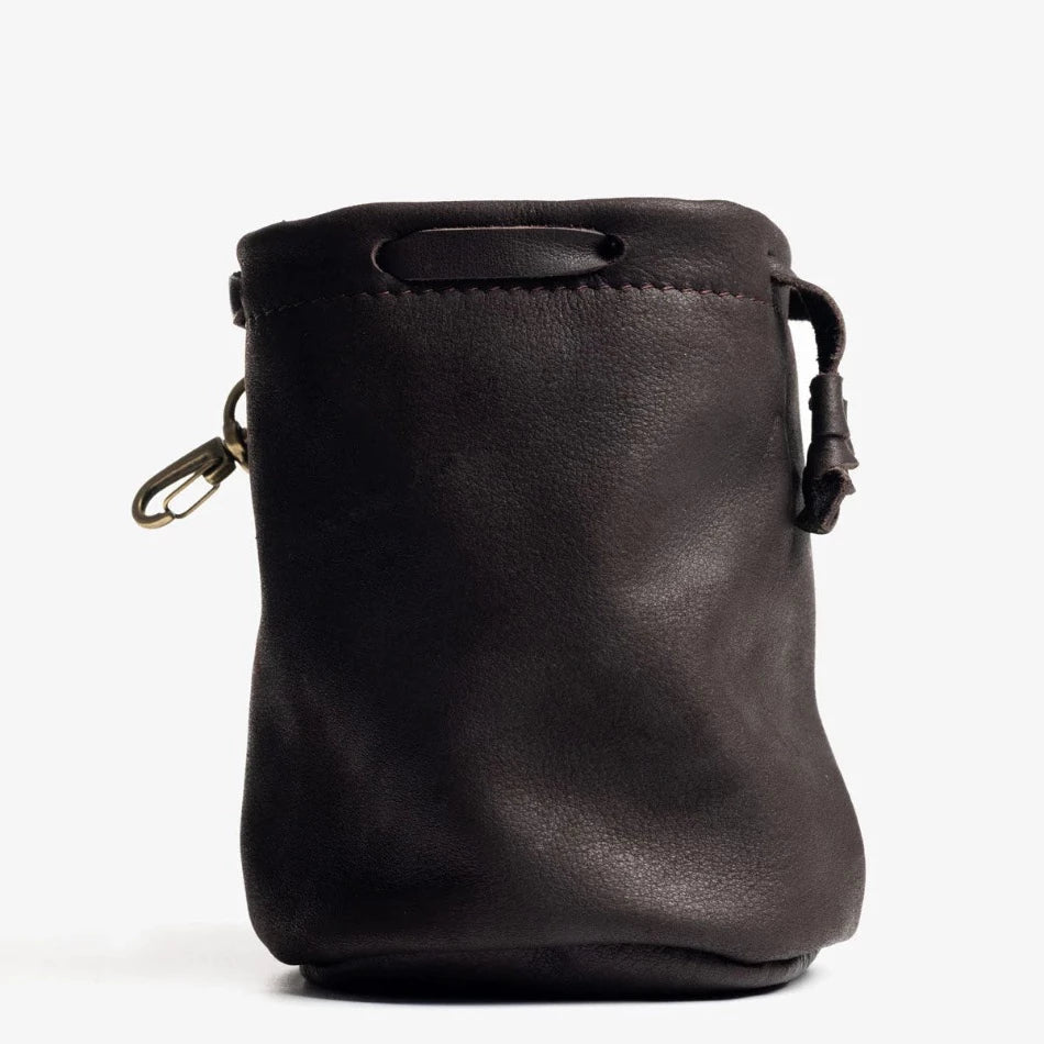 
                  
                    Handcrafted with pebbled leather and a drawcord closure, this golf pouch is the ideal spot to stash all your golfing goodies. Tuck away golf balls, tees, or whatever other teeny treasures you wanna keep close at hand. Problem solved!
                  
                