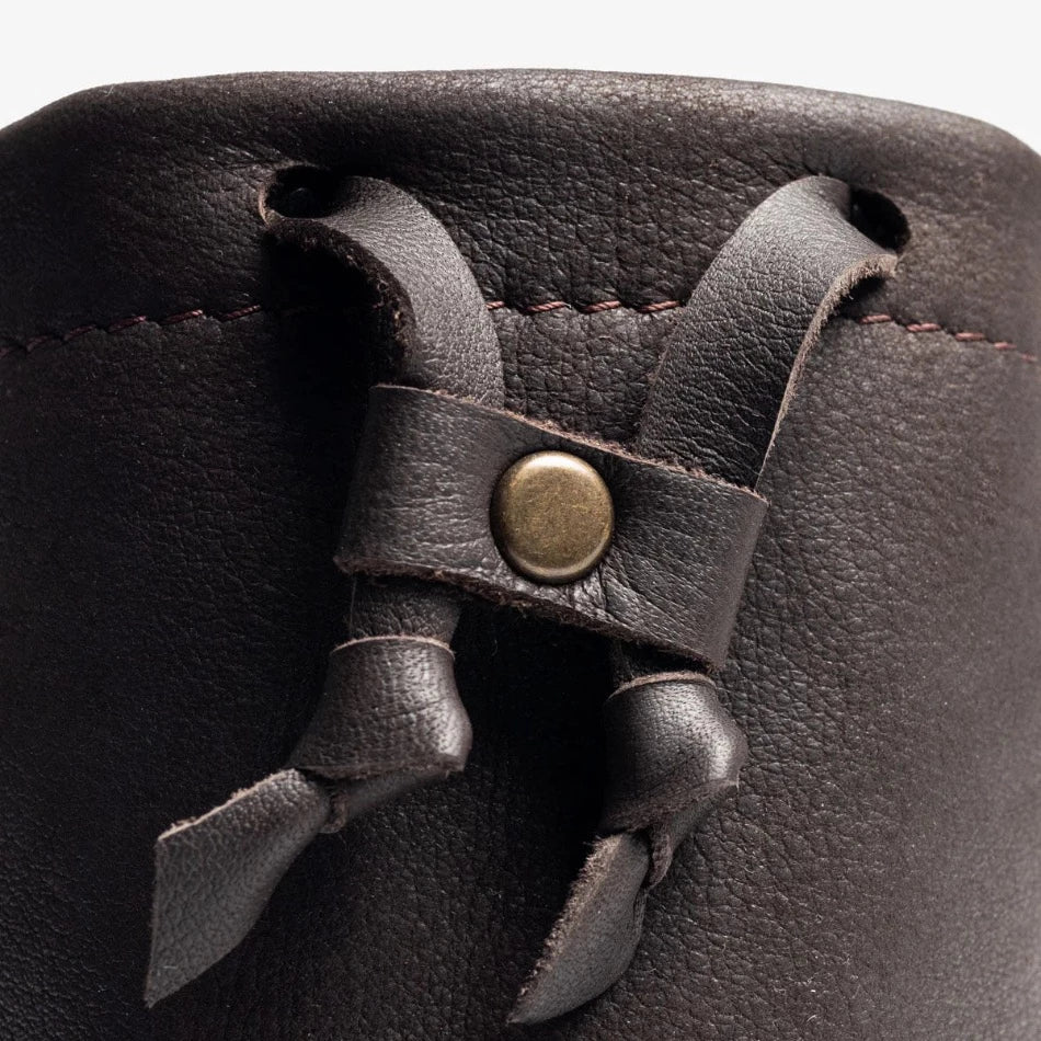 
                  
                    Handcrafted with pebbled leather and a drawcord closure, this golf pouch is the ideal spot to stash all your golfing goodies. Tuck away golf balls, tees, or whatever other teeny treasures you wanna keep close at hand. Problem solved!
                  
                