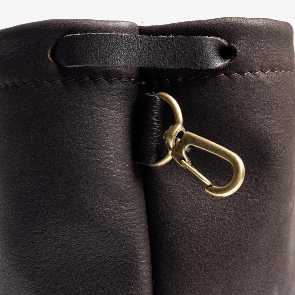 
                  
                    Handcrafted with premium pebbled leather and a secure drawcord closure, this golf pouch bag is the perfect place to carry all your golfing essentials. We’ve added a swivel clip so it can easily hook onto your golf bag for quick access. Whether you need to store extra golf balls, tees,or even some small valuables, this convenientpouch has you covered. 
                  
                