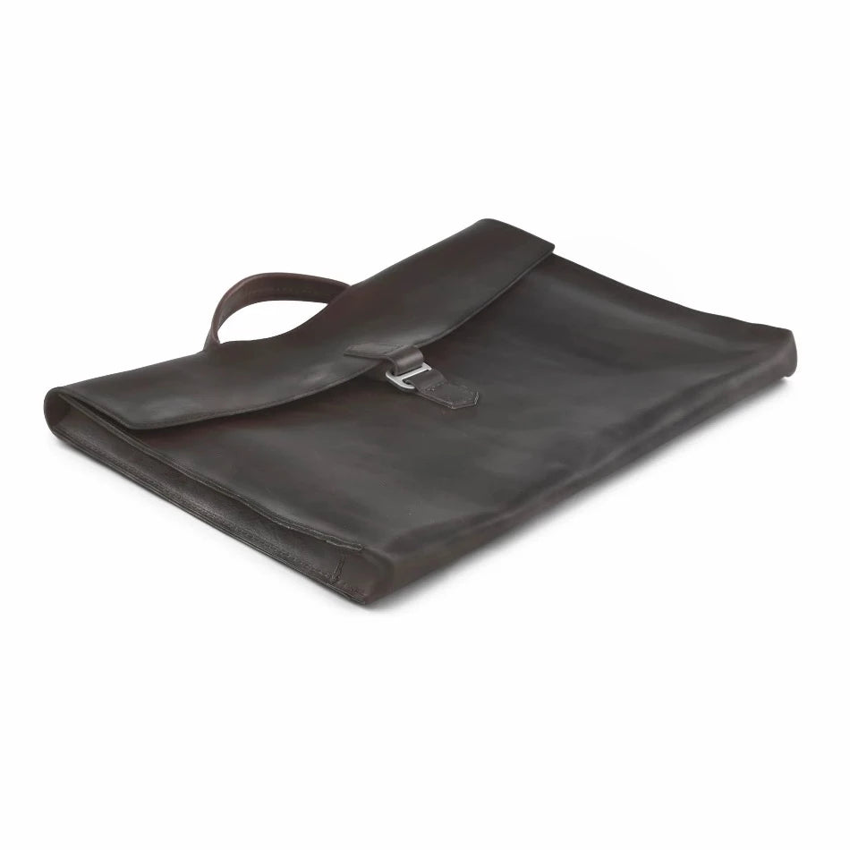 
                  
                    The Diplomat Attaché functions as a carry tool for a laptop, wallet, cell phone, and all your other accessories. It can be carried at your side by its reinforced leather handle or cross-body with the included shoulder strap for a sleek appearance. The top grain leather will keep your gear well protected while looking better over time.
                  
                