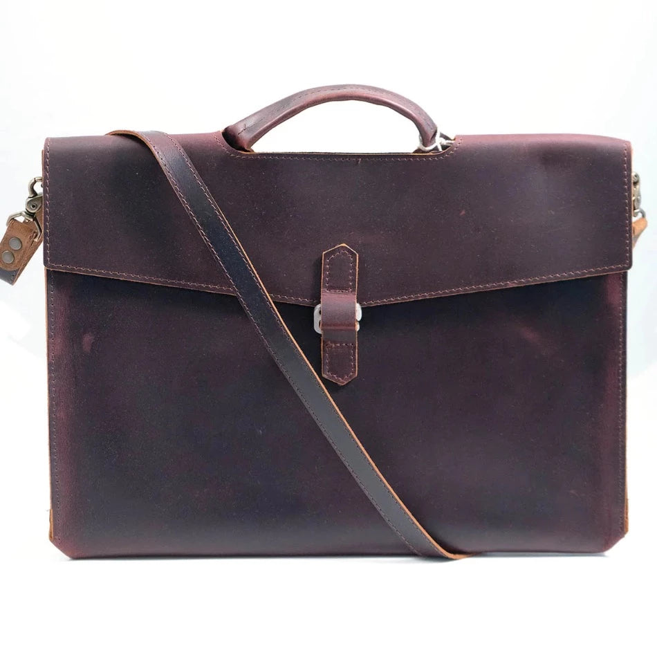 
                  
                    The Diplomat Attaché functions as a carry tool for a laptop, wallet, cell phone, and all your other accessories. It can be carried at your side by its reinforced leather handle or cross-body with the included shoulder strap for a sleek appearance. The top grain leather will keep your gear well protected while looking better over time.
                  
                