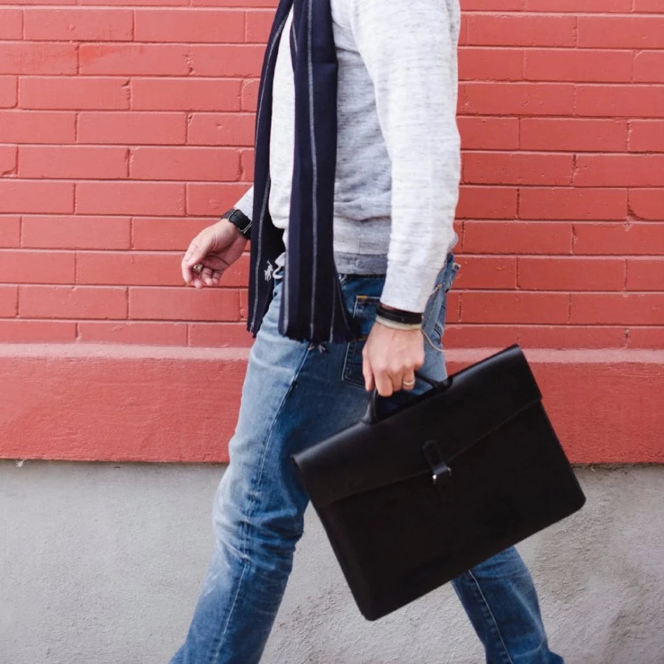 
                  
                    The Diplomat Attaché functions as a carry tool for a laptop, wallet, cell phone, and all your other accessories. It can be carried at your side by its reinforced leather handle or cross-body with the included shoulder strap for a sleek appearance. The top grain leather will keep your gear well protected while looking better over time.
                  
                