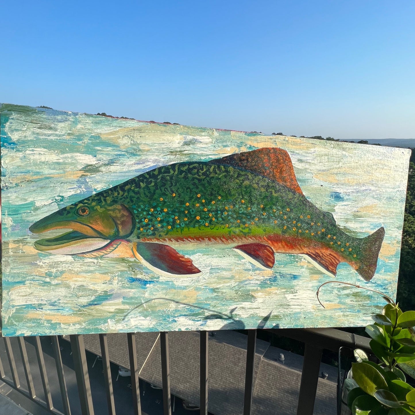 
                  
                    Art Bio: The Brook Trout. This work combines textures and techniques of acrylic painting to create a trout enveloped in an abstracted water space. The use of glazing creates a glow within the colors of the brook trout. All together the colors and techniques in this piece display the natural beauty of the brook trout.
                  
                