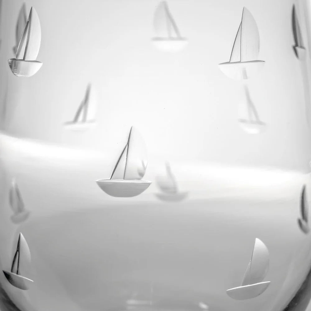 
                  
                    Sailing Stemless Wine Tumbler

Sailing has been a very instrumental part in the development of civilization. Sailboats have been the vehicles that carry us into exploration and discovery. The Sailing collection is a continuation of the exploration of sailing created by our talented designers.&nbsp;

The Sailing 18oz Stemless Wine works well with red or white wine or even just as an everyday glass.

• Dishwasher safe
• US made glassware
• Designed, engraved and polished in Pennsylvania
• 18oz
• H: 4 3/4"&nbs
                  
                