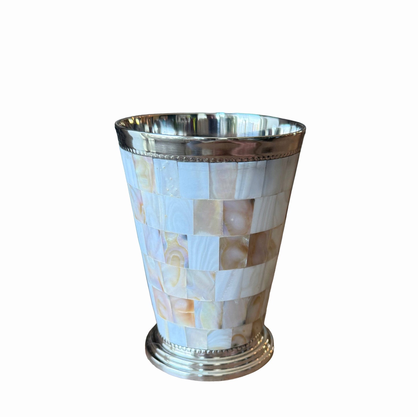 Decorative glass with shell inlay on a white background