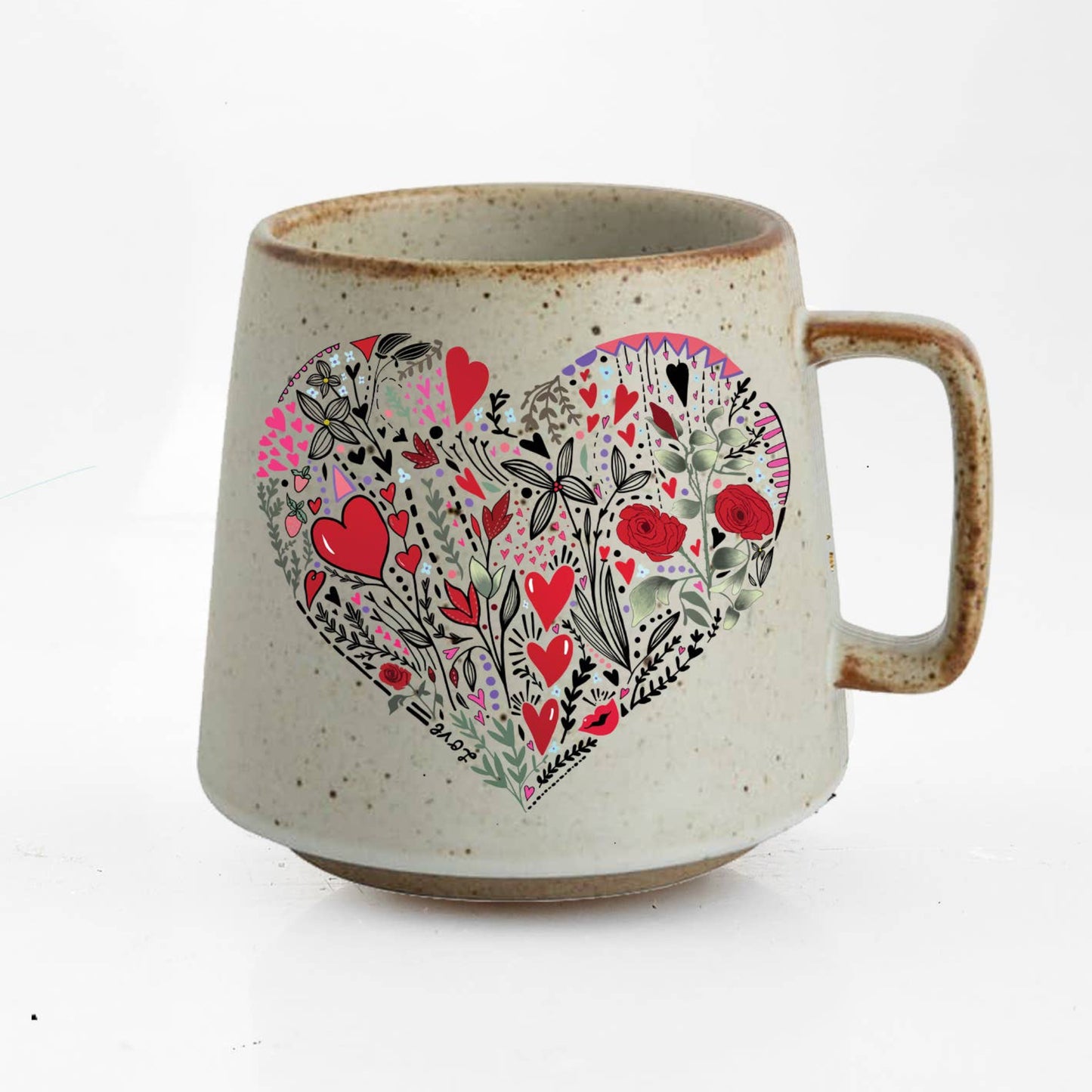 Ceramic mug with a decorative heart design on a white background