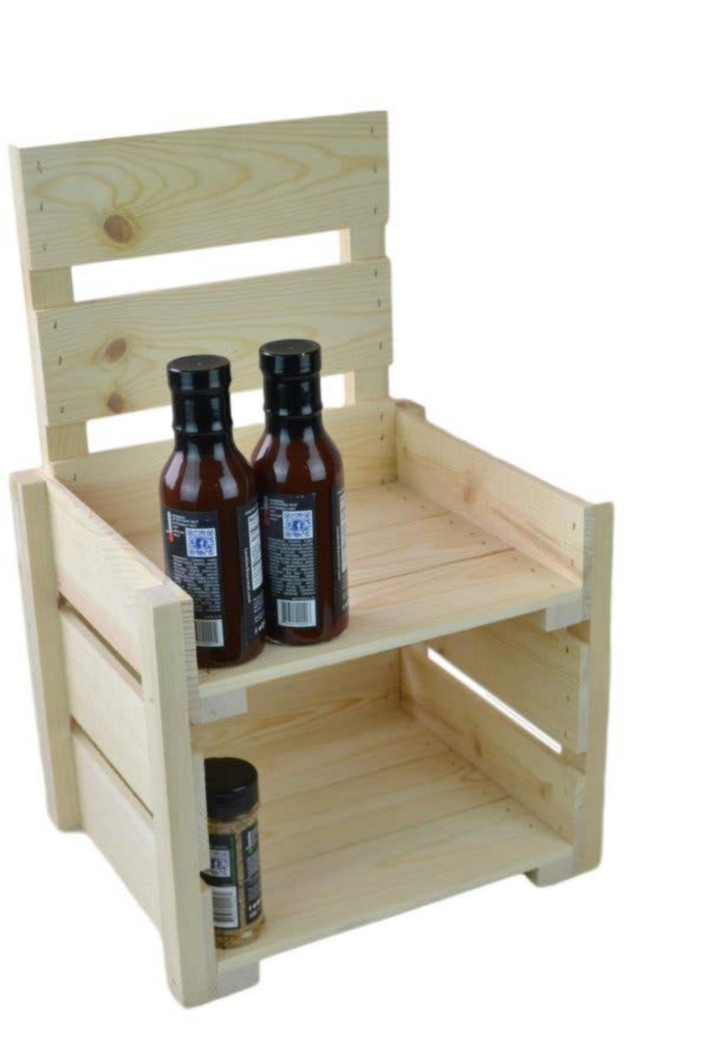 Wooden crate with three bottles on a white background