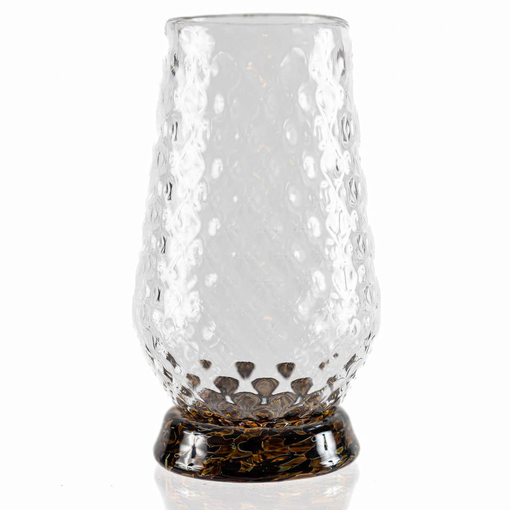 
                  
                    These exquisite glasses are hand-blown right here in the Pacific Northwest. Each of the three glasses is crafted using a unique mold, resulting in their distinct styles. Sold individually, you can assemble your own set.

The Hand-Blown Neat Pour Glass is meticulously crafted to amplify the aromatic notes of your selected spirit, ensuring an exquisite and immersive drinking experience. It is an ideal choice for a diverse range of beverages, including smooth scotch and aged tequila, as well as any other premi
                  
                