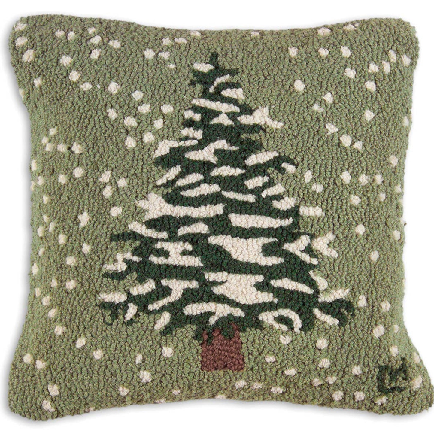 Decorative pillow with a Christmas tree design on a green background