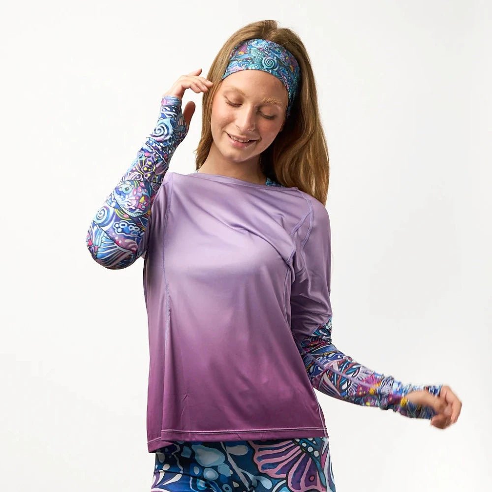 engraved lady casting a fishing pole Enchanted Grayling Backcast Sunshirt