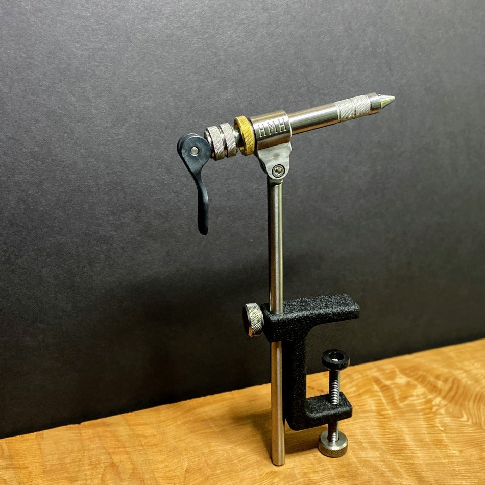 
                  
                    HMH Standard Vise  The HMH Standard vise is made from precision-machined and carefully finished stainless, tool steels and brass.  Each vise is individually hand fitted and tuned for maximum performance.
                  
                