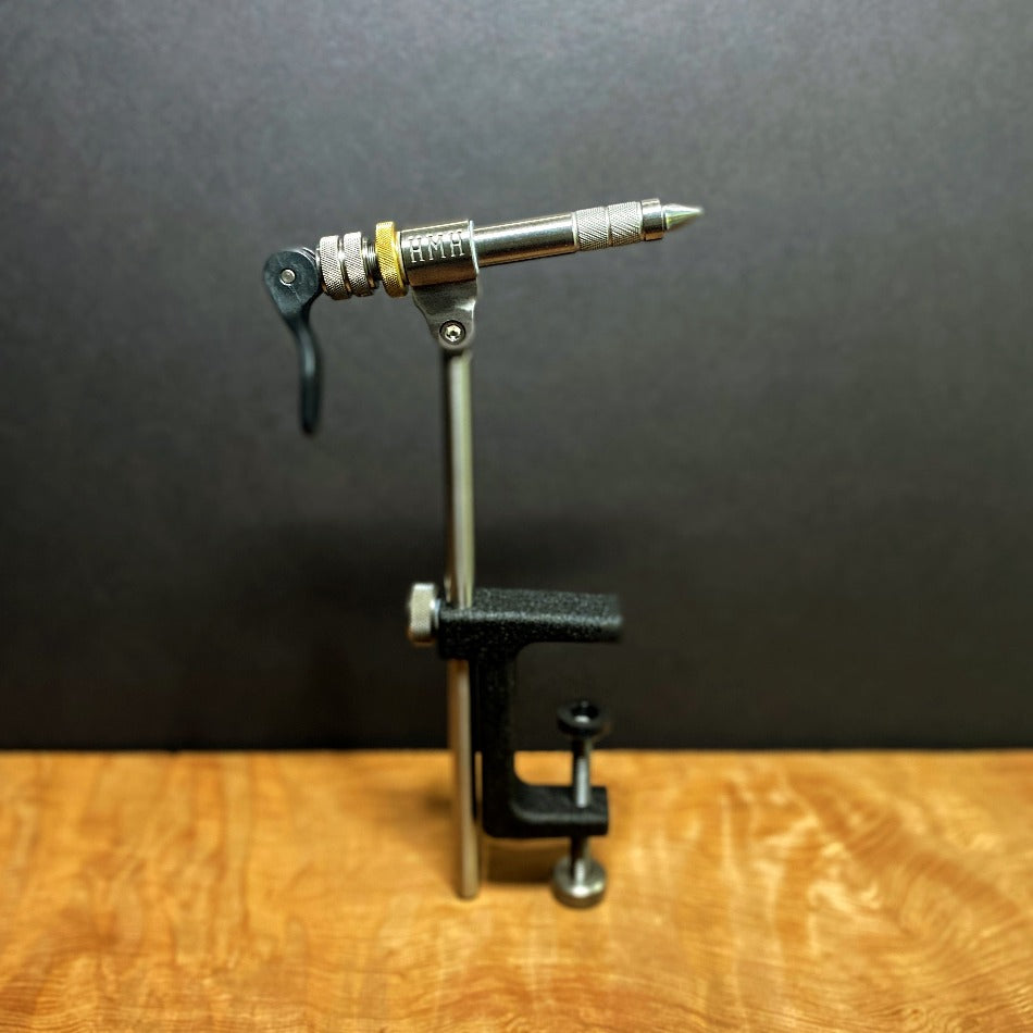 
                  
                    HMH Standard Vise  The HMH Standard vise is made from precision-machined and carefully finished stainless, tool steels and brass.  Each vise is individually hand fitted and tuned for maximum performance.
                  
                