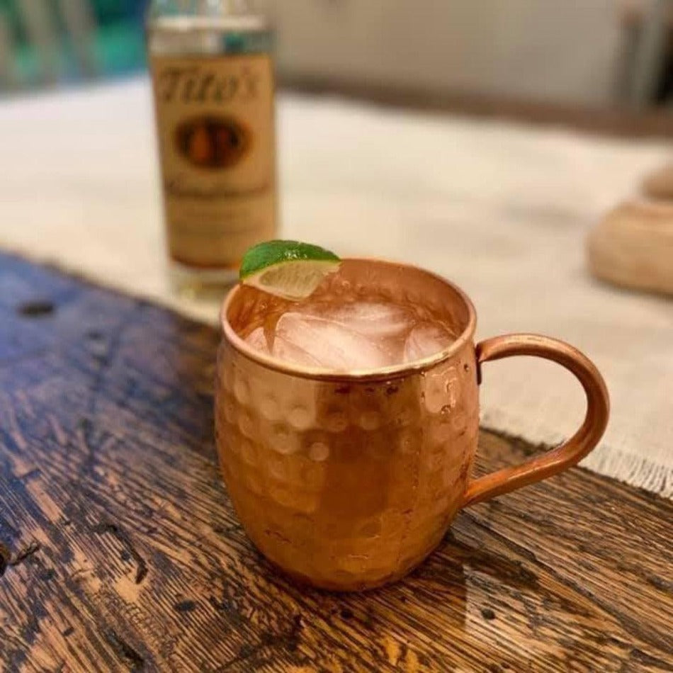 A timeless addition to any kitchen, this rustic mug features a hammered 100% copper barrel surface and oversized, rounded copper handle. Made from 22-gauge pure copper, it's a statement of style and quality.   Barrel Hammered Copper Cup - Fish On! Custom Rods